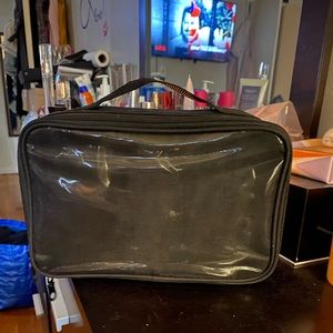 Black travel/make-up case. Great condition